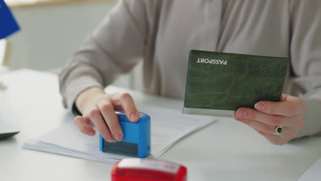 visa officer working with documents in eu embassy