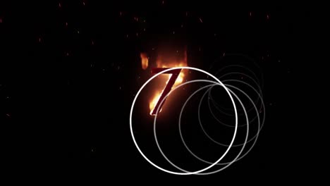 animation of number 7 on fire and white circles spinning on black background