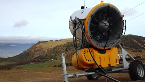 equipment-for-making-artificial-snow-abandoned-on-the-alpine-hills-of-the-Italian-Dolomites