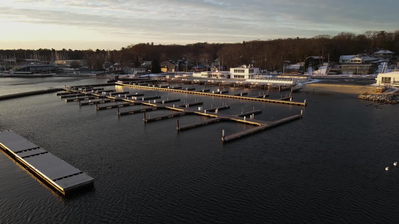 Empty docks on Muskegon lake during the first winter storm of the year