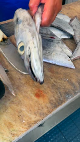 preparing and slicing fish