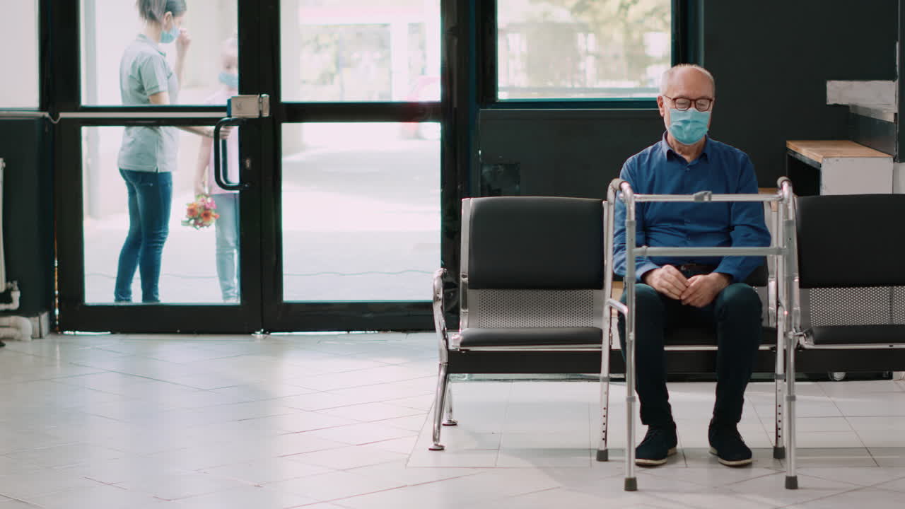 Mother and girl going to see elderly patient in wheelchair