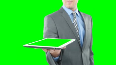 hombre de negocios usando una tableta digital