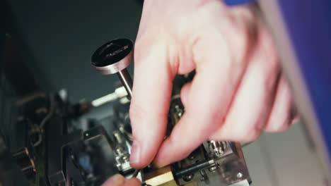 technician repairing precision machinery