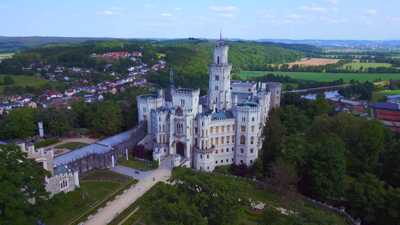 Lovely aerial top view flight Hlubok&aacute; Nad Vltavou is a Fairy tale castle in Czech Republic Europe, summer day 2023