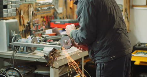 angle grinder cutting metal at workshop 39