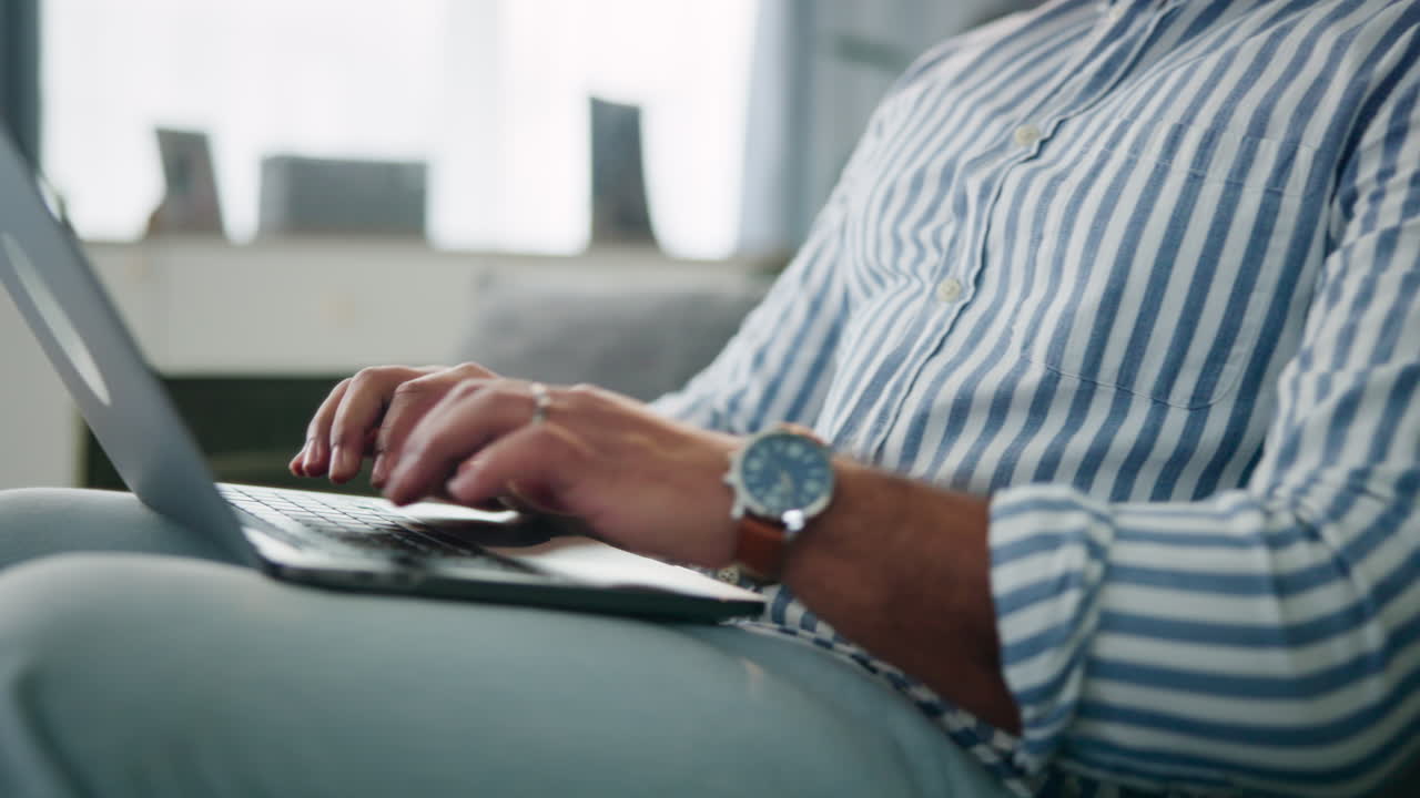 Man using laptop at home
