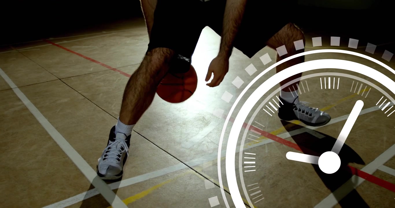 Basketball athlete starting dribbling upon timer fading in, alternating crossovers showing control