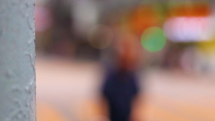 Bokeh view of traffic and pedestrians in Hong Kong