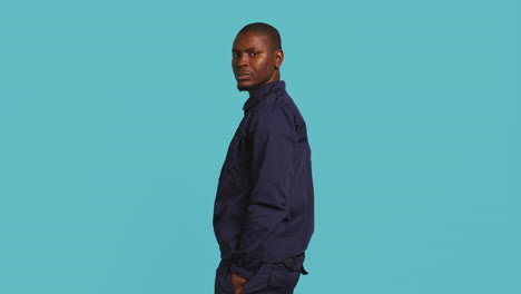 portrait of security guard overseeing premises turning around