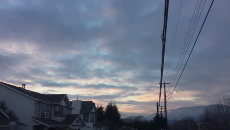 sunset above calm neighborhood traffic