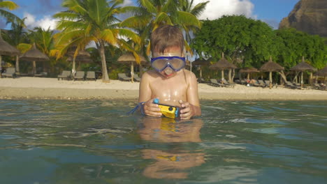 kid bathing with waterproof camera