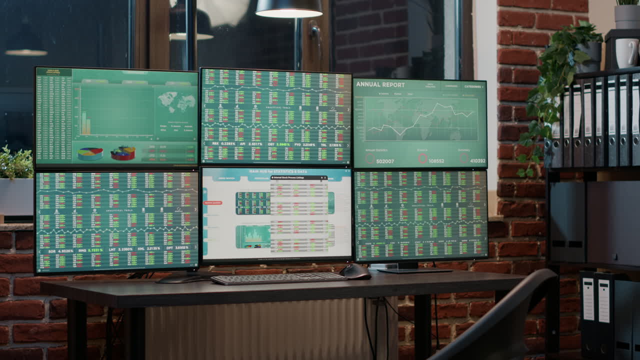 Female analyst looking at exchange market statistics on laptop