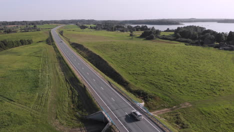 Aerial-view-of-cars-driving-on-highway