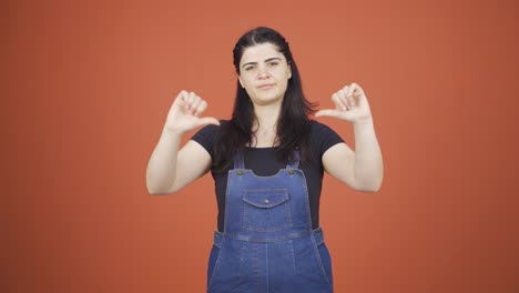 Woman-looking-at-camera-with-a-negative-expression.