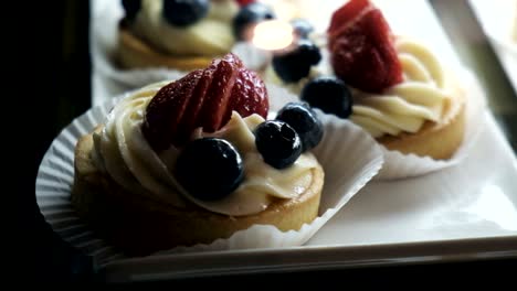 fresh and tasty cake with strawberry and blueberry