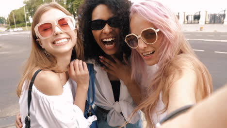 three friends taking a selfie