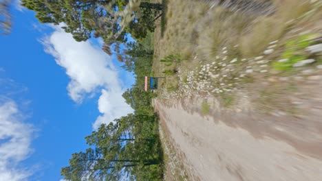 Flyover-along-road-leading-to-Valle-Nuevo-white-memorial-monument-to-Caamano-Colonel-in-Dominican-Republic