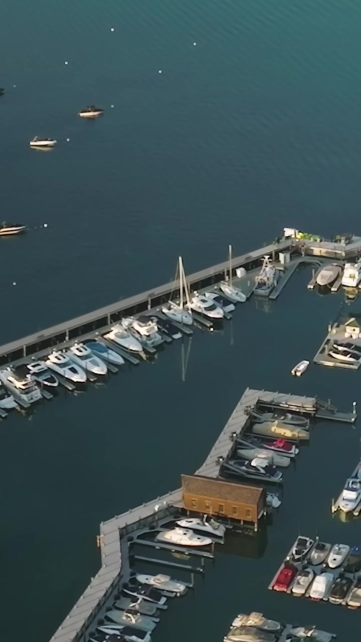 Boats docked at Lake Tahoe marina in California and Nevada during daytime