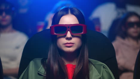 girl putting on 3d glasses