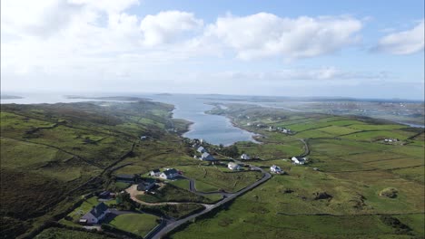 kenmare bay in county kerry, ireland during summer establishing aerial with copy space