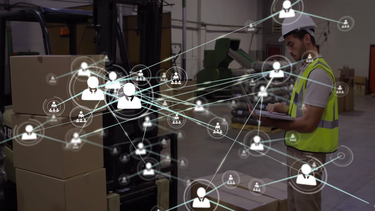 Warehouse worker scrolling tablet and initiating digital user network overlay monitoring inventory