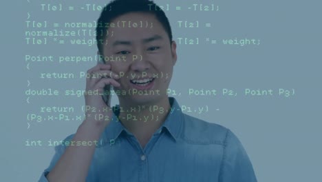 animation of data processing against asian man talking on smartphone at office