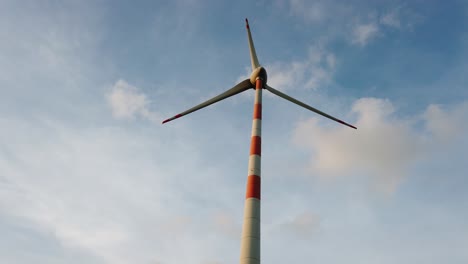 windmill from a wind farm in india, natural renewable energy, clean and green energy to power homes - footage for presentation