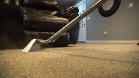 cleaning a carpet in a big house