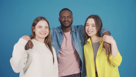 Close-up-portrait-of-a-group-of-friends-of-different-races.-Smile,-friendship-and-brotherhood.