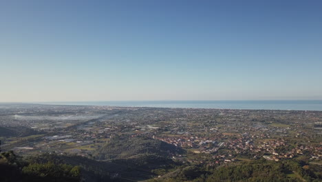 Drone-Reveal-Shot-of-Tuscan-Coast-and-Lido-di-Camaiore-in-Italy