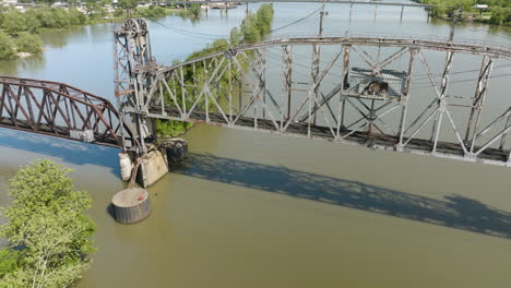 Bridge-Over-Arkansas-River-Near-Lee-Creek-Park-In-Van-Buren,-AR,-USA-At-Daytime---drone-shot