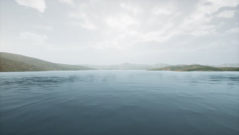 lake in hills on summer day