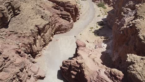 Flying-over-the-red-canyon-in-Eilat,-Israel