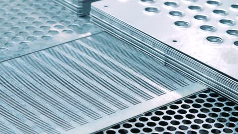 Lattice-plates-for-production-needs.-Grid-metal-sheets-after-stamping-process