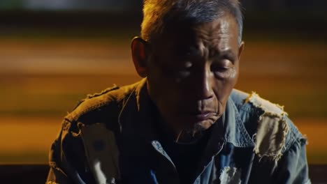 reflective moments: an elderly man contemplates life in soft twilight, capturing the depths of thought and experience amidst the calmness of the evening