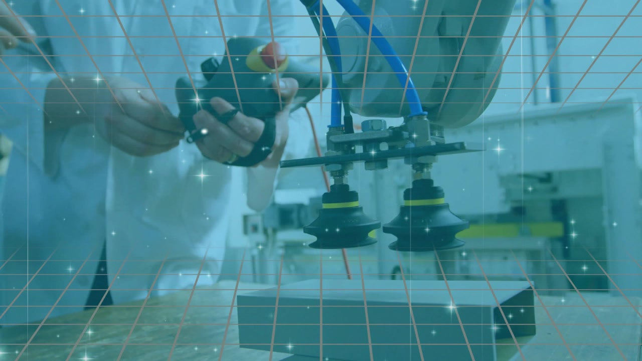 Male researcher pressing button, activating robotic arm, aligning cups while grid overlay shining