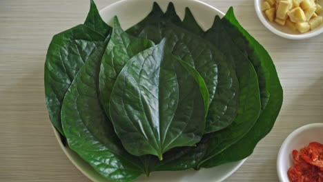 miang kham - a royal leaf wrap appetizer - it is a traditional southeast asian snack from thailand and laos