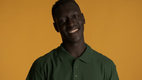 African-american-man-on-yellow-background.