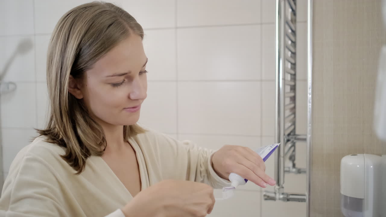 Woman Brushing Her Teeth