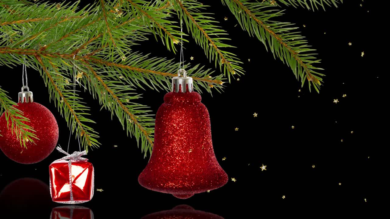 Breeze causing red bell swinging while stars drifting over dark backdrop, adding festive glow