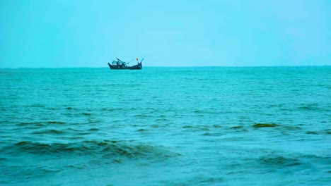 Isolated-Fishing-Trawler-Boat-In-The-Indian-Ocean-With-Moody-Weather-Near-Kuakata-Beach,-Bangladesh