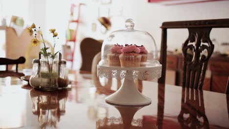 home made tasty delicious fresh colorful cupcake at home old vintage table medium shot during day time