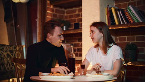 couple enjoying a date night in a cozy cafe