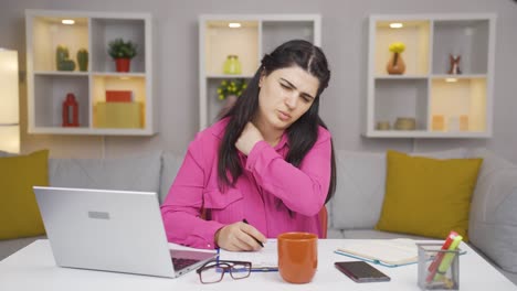home office worker woman has shoulder pain.