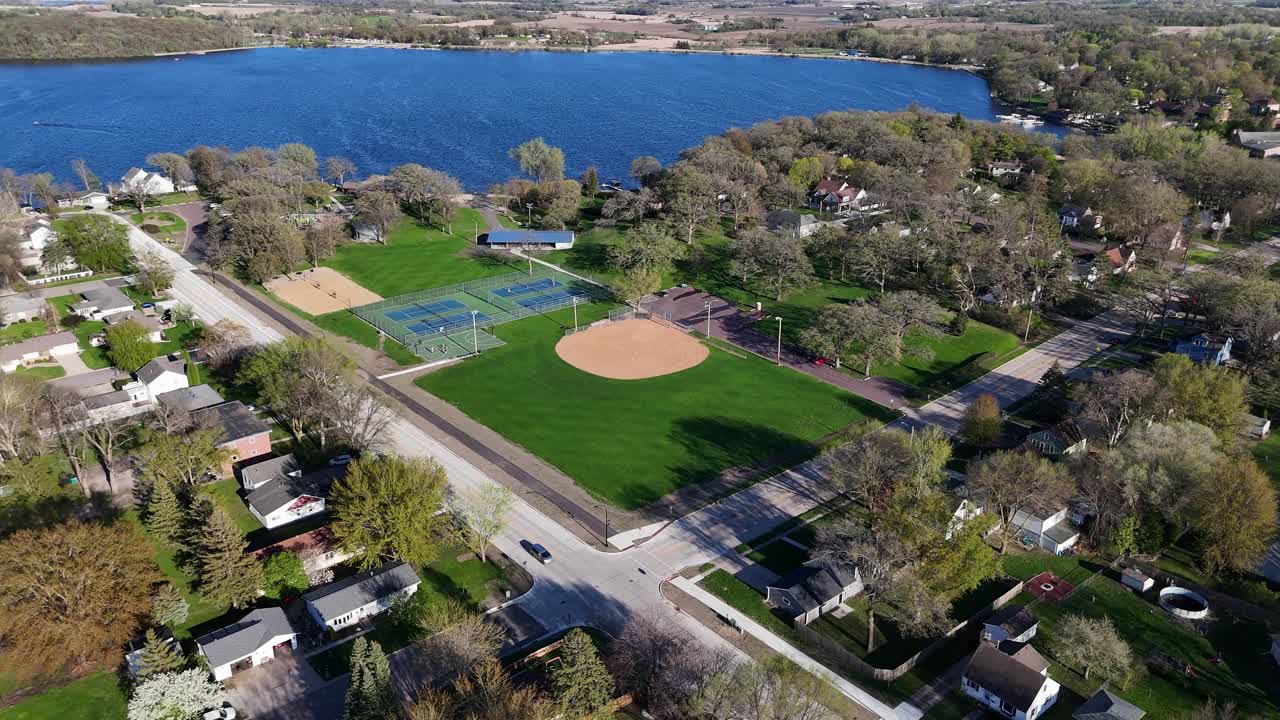Baseball Field next to Lake, Volley Ball Court, Basketball Court, Drone View, Clear Lake Park in Waseca Minnesota, Summer, Kids playing basketball,