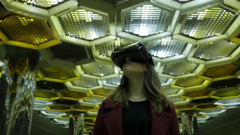 woman wearing vr headset in modern architectural setting