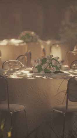 outdoor wedding reception with white flowers and tables