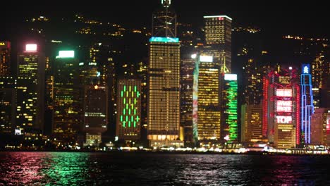 colorful light show over hong kong skyline