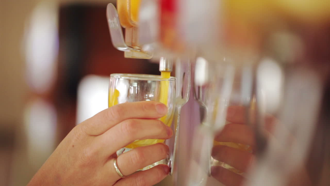 Juice pouring in slow motion